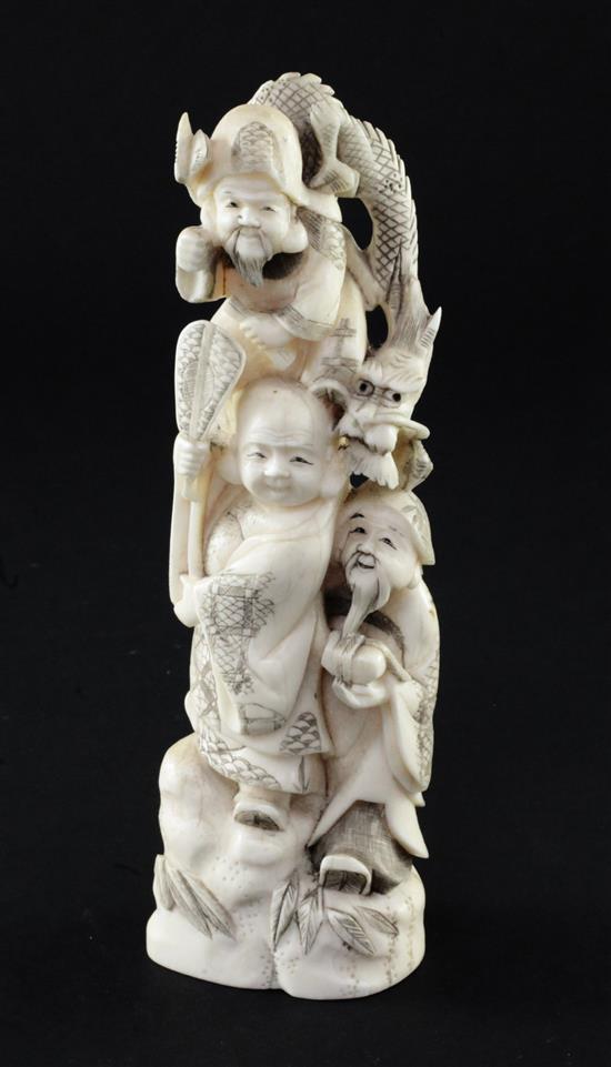 A Japanese walrus ivory okimono, early 20th century, 19cm